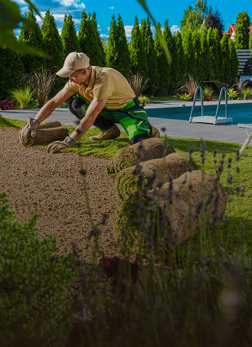 Image of a man working on a landscaping