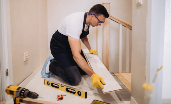 Image of a man working in a house
