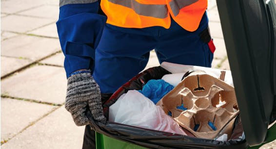 A person collecting trash