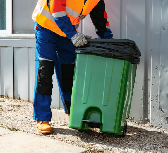 A person collecting trash