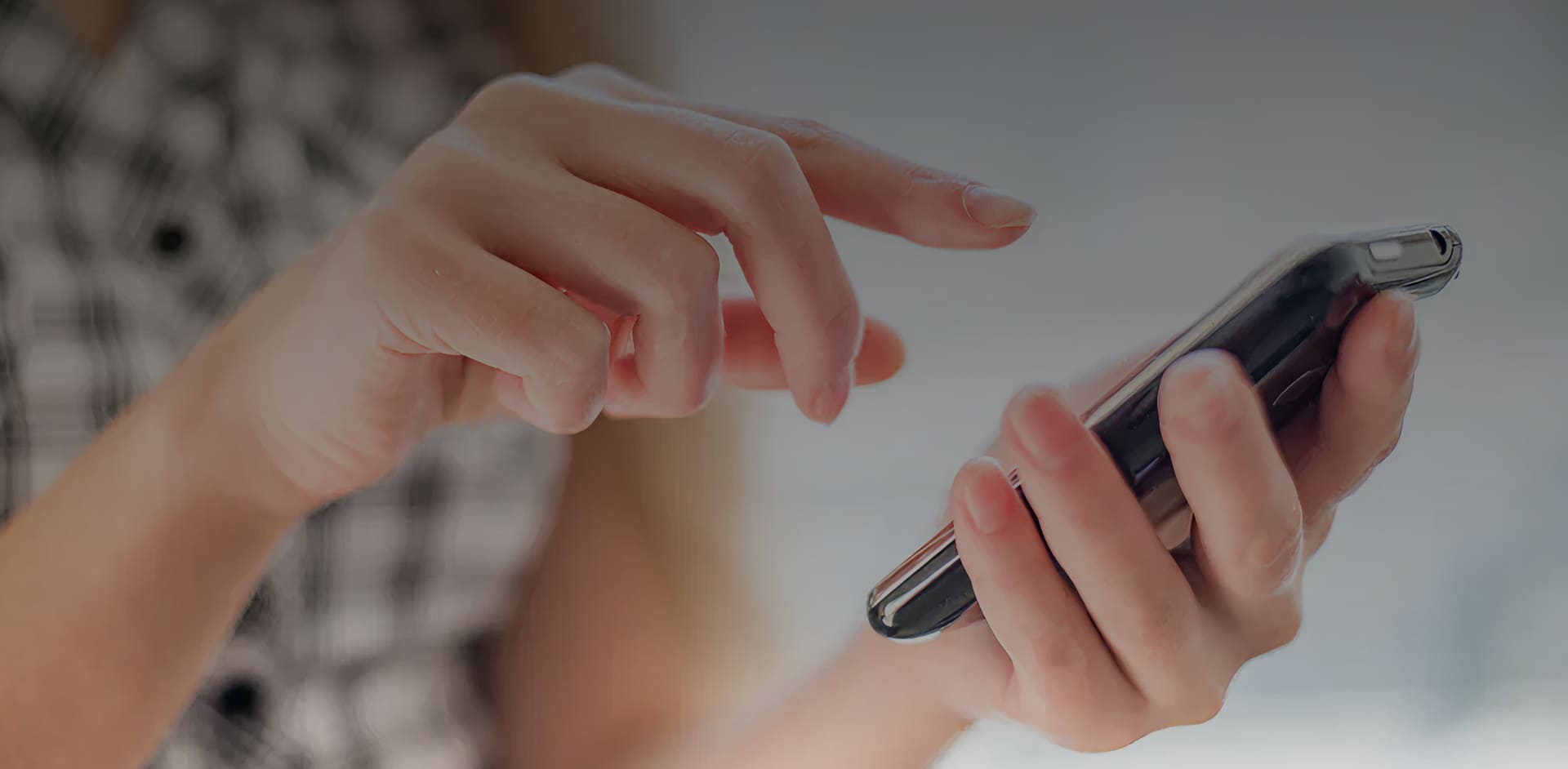 Image of a person using a cellphone